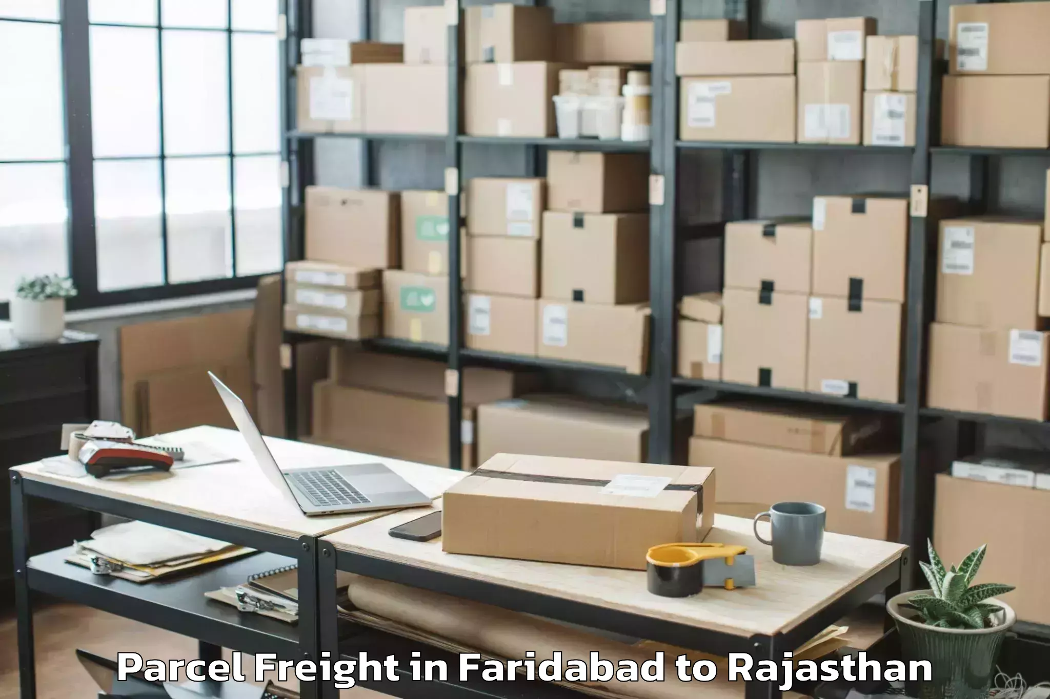 Book Faridabad to Laxmangarh Parcel Freight Online